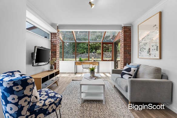 The sitting room, with glass atrium, at 4 Samantha Close, was a draw card for bidders.