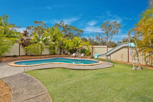 The pool, which features a waterslide, is a great draw for families with children, said the listing agent.