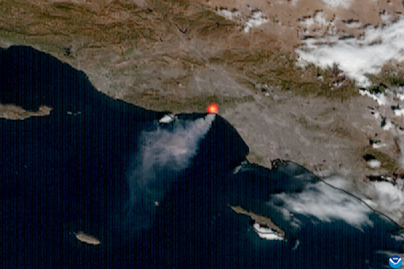 Satellite imagery captured the Palisades fire burning in northern Los Angeles on Tuesday.