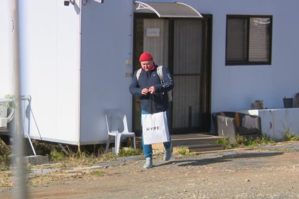 A Russian diplomat who had been staying at a shed on the site of a proposed Russian Embassy in Canberra leaves in June 2023.