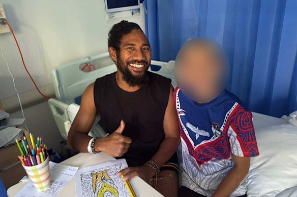 Francis Wilson in hospital following surgery on his skull.