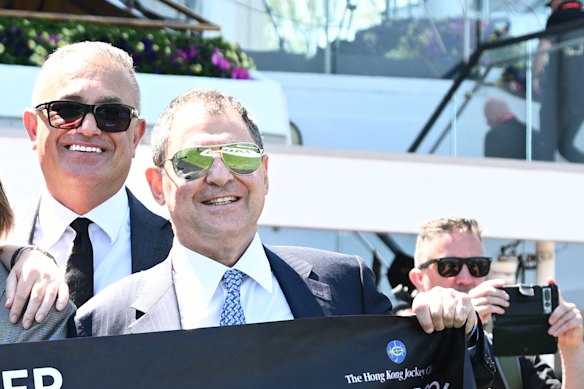 Owner Jonathan Munz (right) Getta Good Feeling won the Wakeful Stakes. John Kanga is at left.