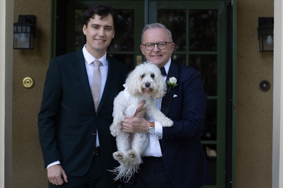 Prime Minister Anthony Albanese and his son, Nathan, with beloved dog and ringbearer Toto. 