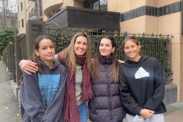 Kyra Cooney-Cross (right) with her mother Jessica and two of her three younger sisters.