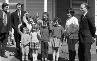 Victorian Education Minister Lindsay Thompson with Mary Gibbs and her six students after their rescue from the kidnappers.  