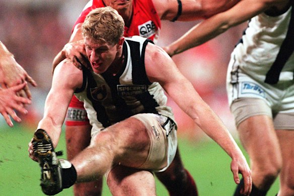 Stephen Patterson (front) in action for Collingwood. 
