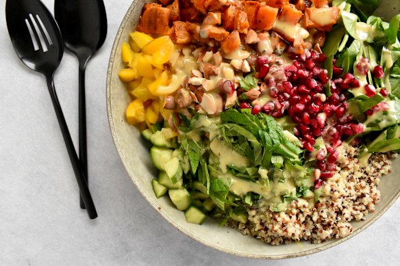 Creamy tahini dressing ties everything together in this sweet potato, quinoa and apple salad.