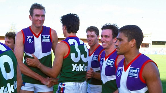 Fremantle players celebrate the club’s first win in the AFL, against Fitzroy in 1995.