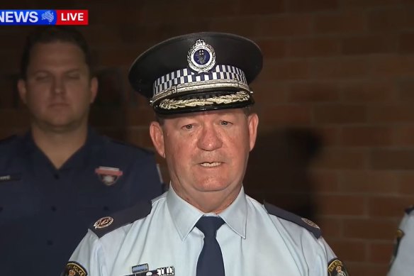 Assistant Commissioner Anthony Cooke speaks at press conference on Saturday evening.