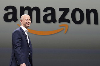 Amazon founder Jeff Bezos walking on stage in 2012. The company's latest result has pushed the tech giant back into the 