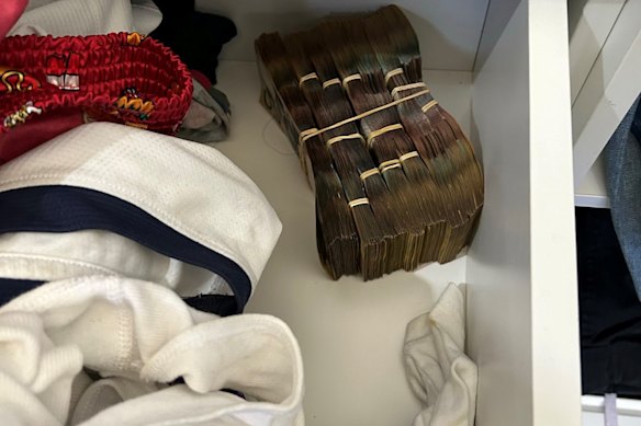 Police allegedly found $35,000 in a drawer at a Villawood unit.