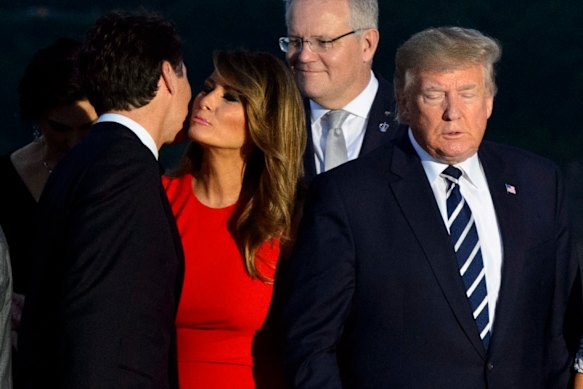 Canadian Prime Minister Justin Trudeau (left) greets Melania Trump as she arrives for a family photo with US President Donald Trump, during the G7 Summit in Biarritz, France in 2019.