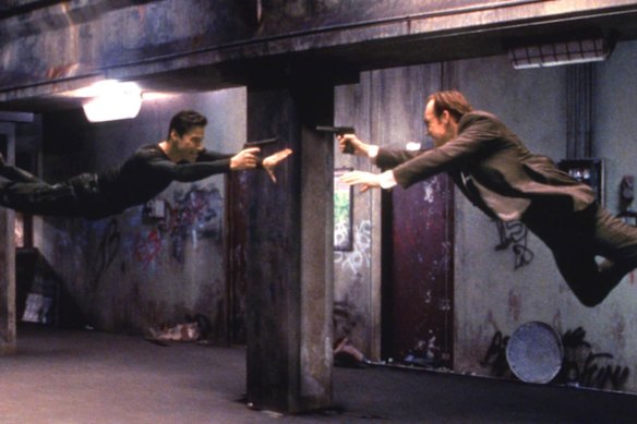  Keanu Reeves and Hugo Weaving in science fiction film The Matrix.