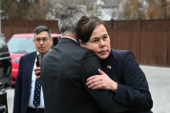 Vivian Motzfeldt, Greenland’s foreign minister, embraces Danish ambassador to the US, Jesper Møller Sørensen, in Washington on Wednesday.