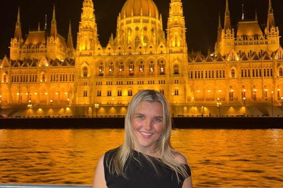 Katie Berridge in front of the Hungarian Parliament and Danube River in Budapest.