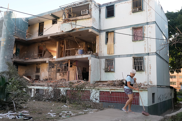 A damaged apartment complex that neighbours say was hit during US strikes to capture Venezuelan President Nicolás Maduro on Saturday.