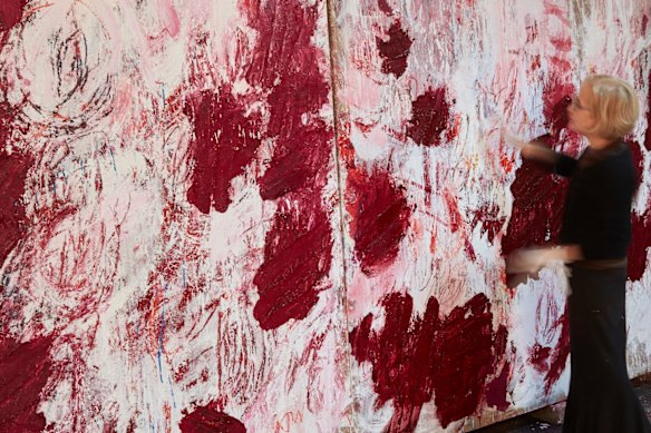 Aida Tomescu in her studio in 2019. She builds her paintings up over many years, through a process that involves painting and scraping back.