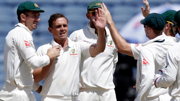 Steve O’Keefe celebrates one of his 12 wickets during the 2017 Test in Pune.