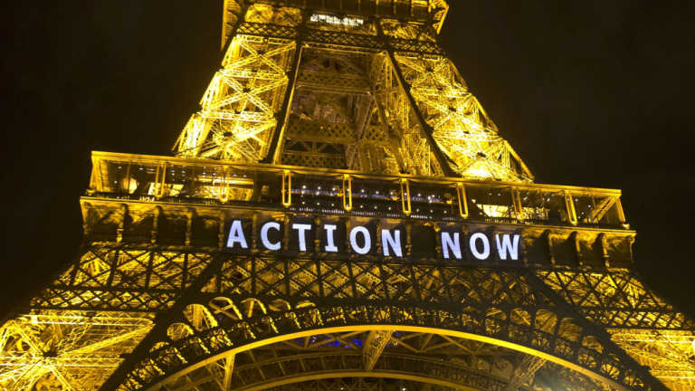 The Eiffel Tower lit up during the UN climate conference in Paris in 2015.