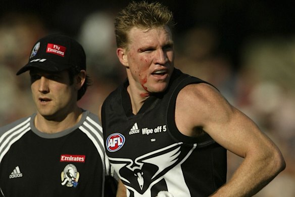 Nathan Buckley wearing the iconic swooping magpie guernsey in 2002