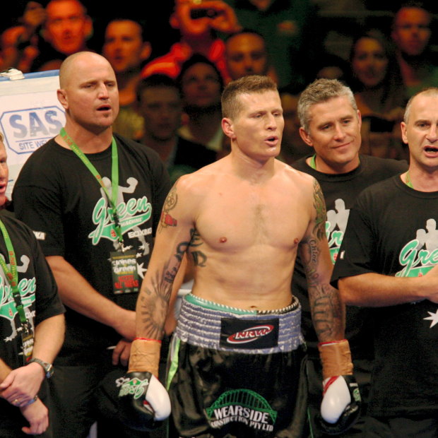 Angelo Hyder (far right) and Australian world champion Danny Green before the game