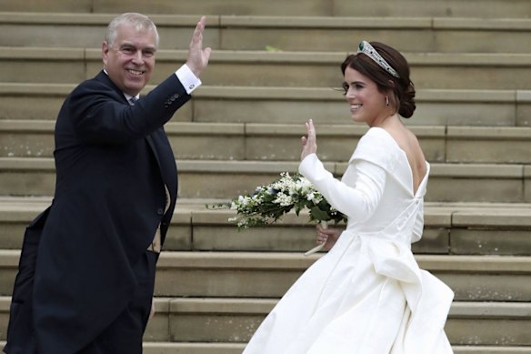 Princess Eugenie arrives with her father, Andrew Mountbatten-Windsor, for her wedding at Windsor Castle in 2018.