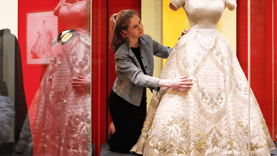 A new exhibition in London tracks the late Queen’s fashion and style over her life and reign.