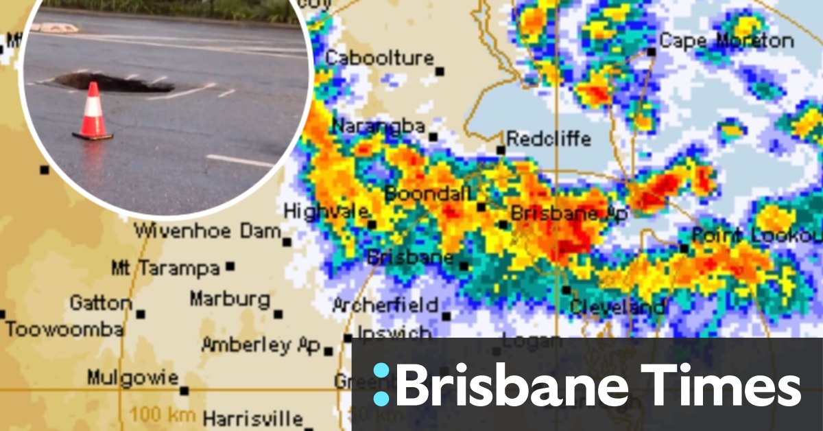 Heavy rains and sinkholes disrupt morning commute ahead of hot days in Brisbane