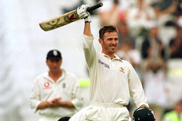 Damien Martyn raises his bat for an Ashes century in Birmingham in 2001.