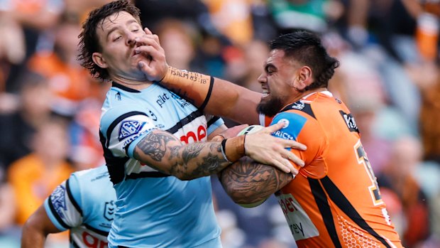  Royce Hunt takes a carry against his former club the Sharks last year.