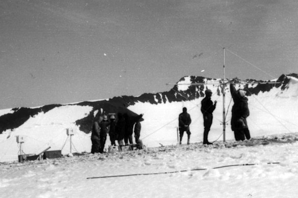 The team sets up equipment during a test run on Mount McKinley in Alaska.