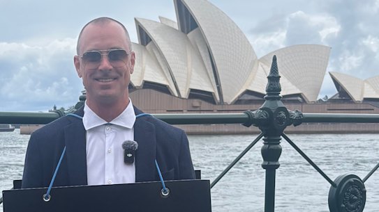 Chris Elston, known online as Billboard Chris, and aide Lois McLatchie Miller, left, in Sydney earlier this year.