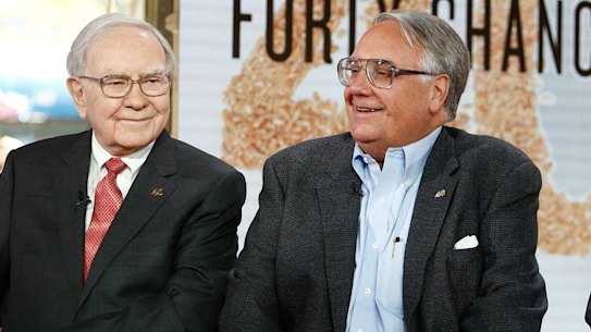 Warren Buffett with son Howard G. Buffett and grandson Howard W. Buffett.