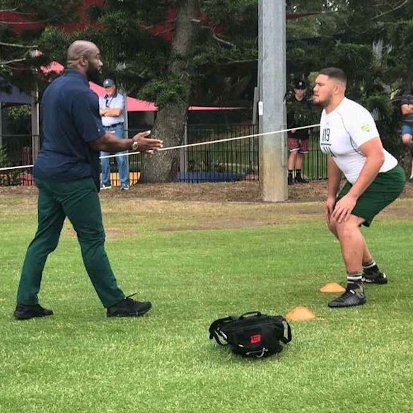 Manny Meafou at the NFL International Player Combine on the Gold Coast in 2018. He is being tutored by former NFL star LeCharles Bentley.