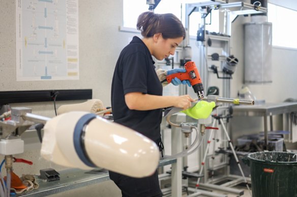 Physical therapist Viktoriia Faryna moulds each prosthetic to fit its owner.