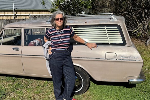  Tracey Walker with her 1964 Toyota Crown Station Wagon. Walker organises the Old Girls on the Road community group. 