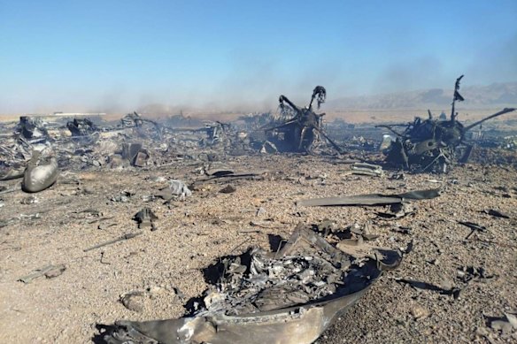 A still image released by Iranian media purporting to show a US aircraft destroyed during the US mission to find a stranded airman in Iran.