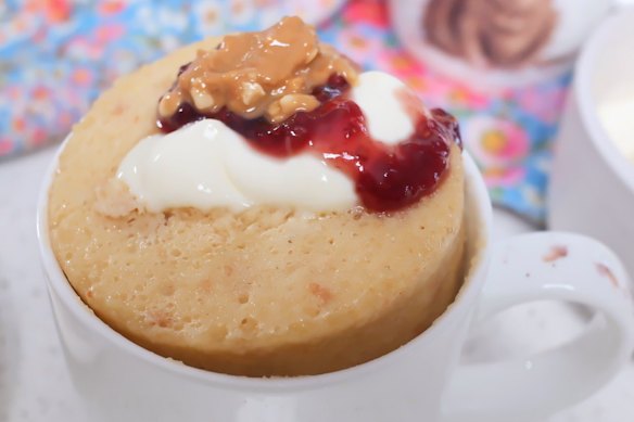 Serve this PB&amp;J mug cake with an extra dollop of peanut butter and jam.