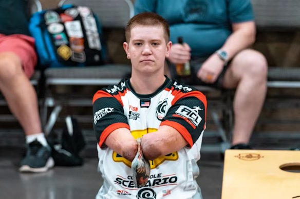 Webber during a cornhole competition