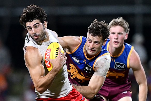 Christian Petracca running around in his new Gold Coast colours.