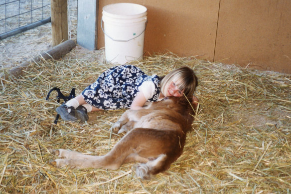 As a child, Kah was often found sleeping with the miniature ponies she learnt to ride on.