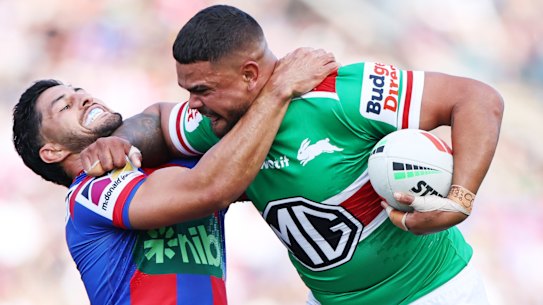 Dylan Brown tries to contain Latrell Mitchell on Sunday.