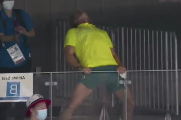 Ariane Titmus’ coach Dean Boxall’s infamous Tokyo celebration, channelling a wrestler.