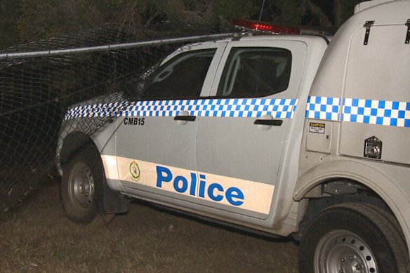 A police vehicle wedged into the fence at the golf course.