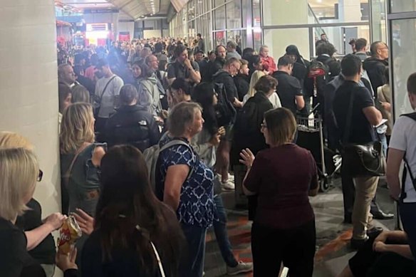Passengers being evacuated on Friday night from Melbourne Airport.