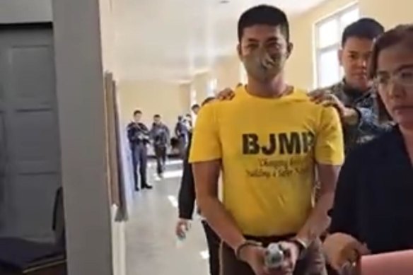 Ronel Estipona Perido on his way to court.