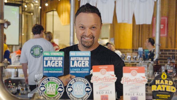 Steven Bradbury behind the bar at Last Man Standing, his brewery across the road from Suncorp Stadium in Brisbane.