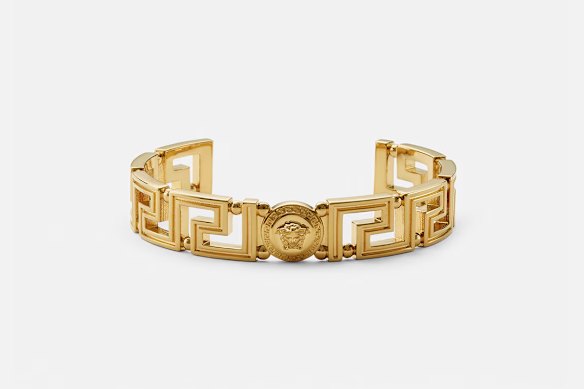 A Versace gold bracelet.