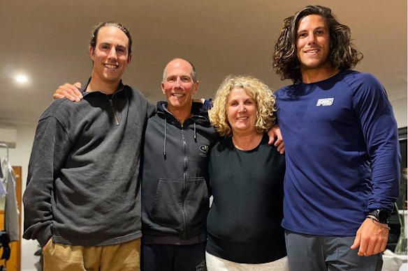 Jake and Callum Robinson were killed while on a surfing trip in Mexico. They are pictured with their parents, Martin and Debra.
