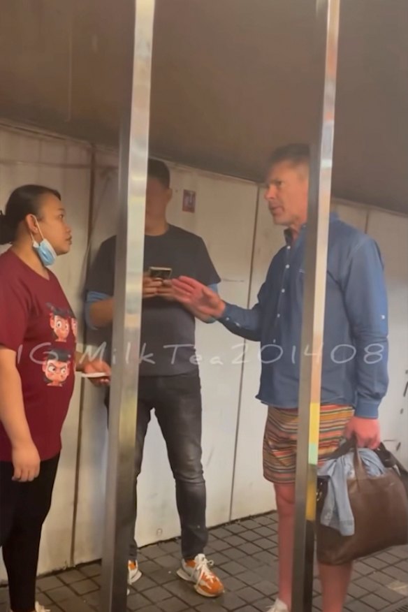 Screen grab from social media in Hong Kong of Samuel Monkivitch being pursued by restaurant staff over unpaid bills.